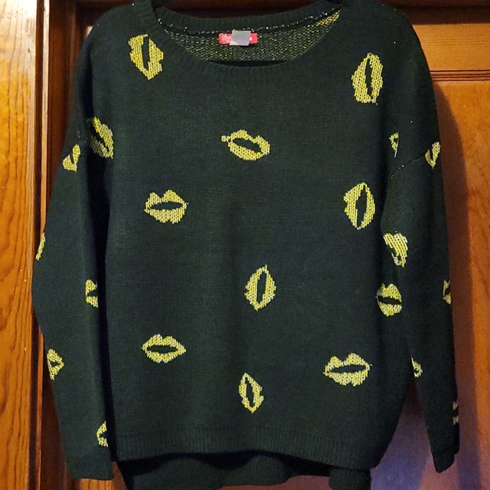 Black sweater with gold lips size m/l